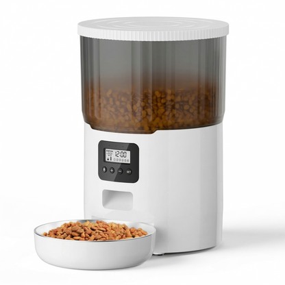 White automatic dog feeder with transparent food storage displaying remaining kibble level